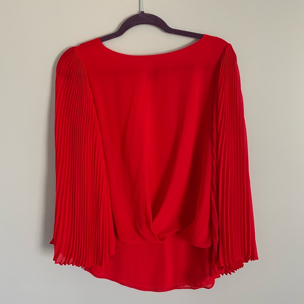 Vince Camuto red shirt with pleated sleeves and bunched front. Size M.